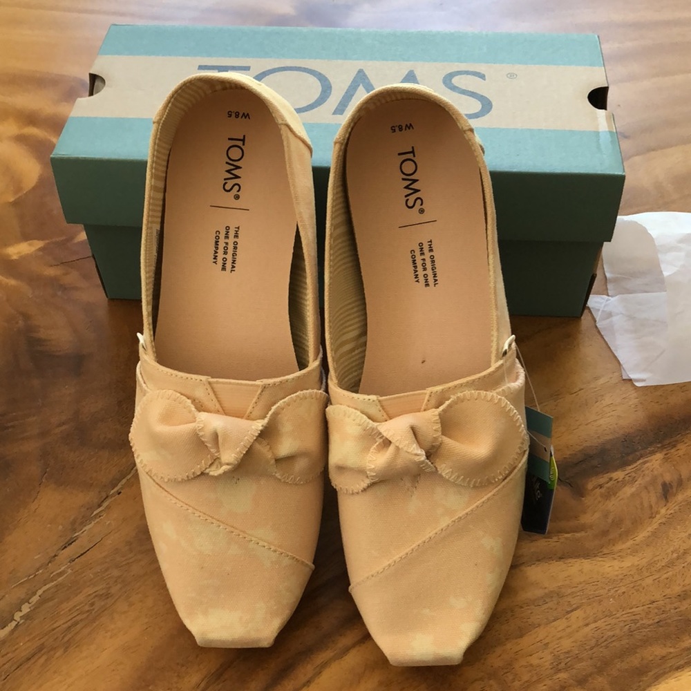 Brand new Toms canvas slip on shoes